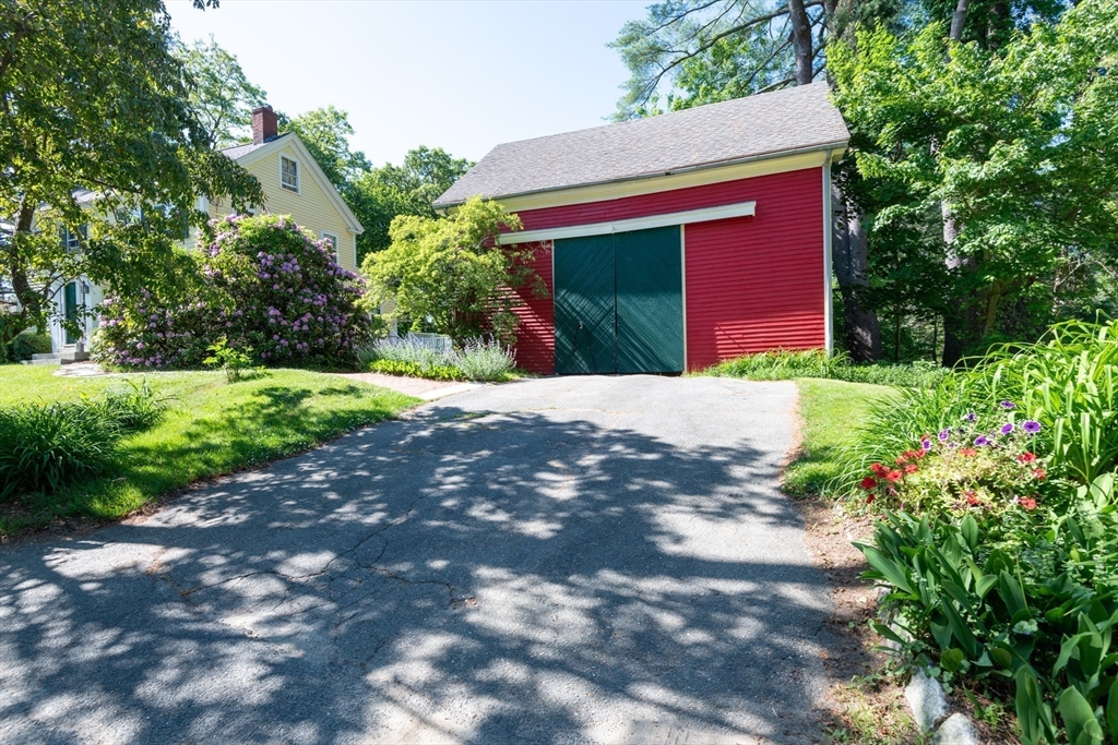 304 North Street Georgetown, MA 01833 - Photo 6 of 42 a front view of a house with a yard