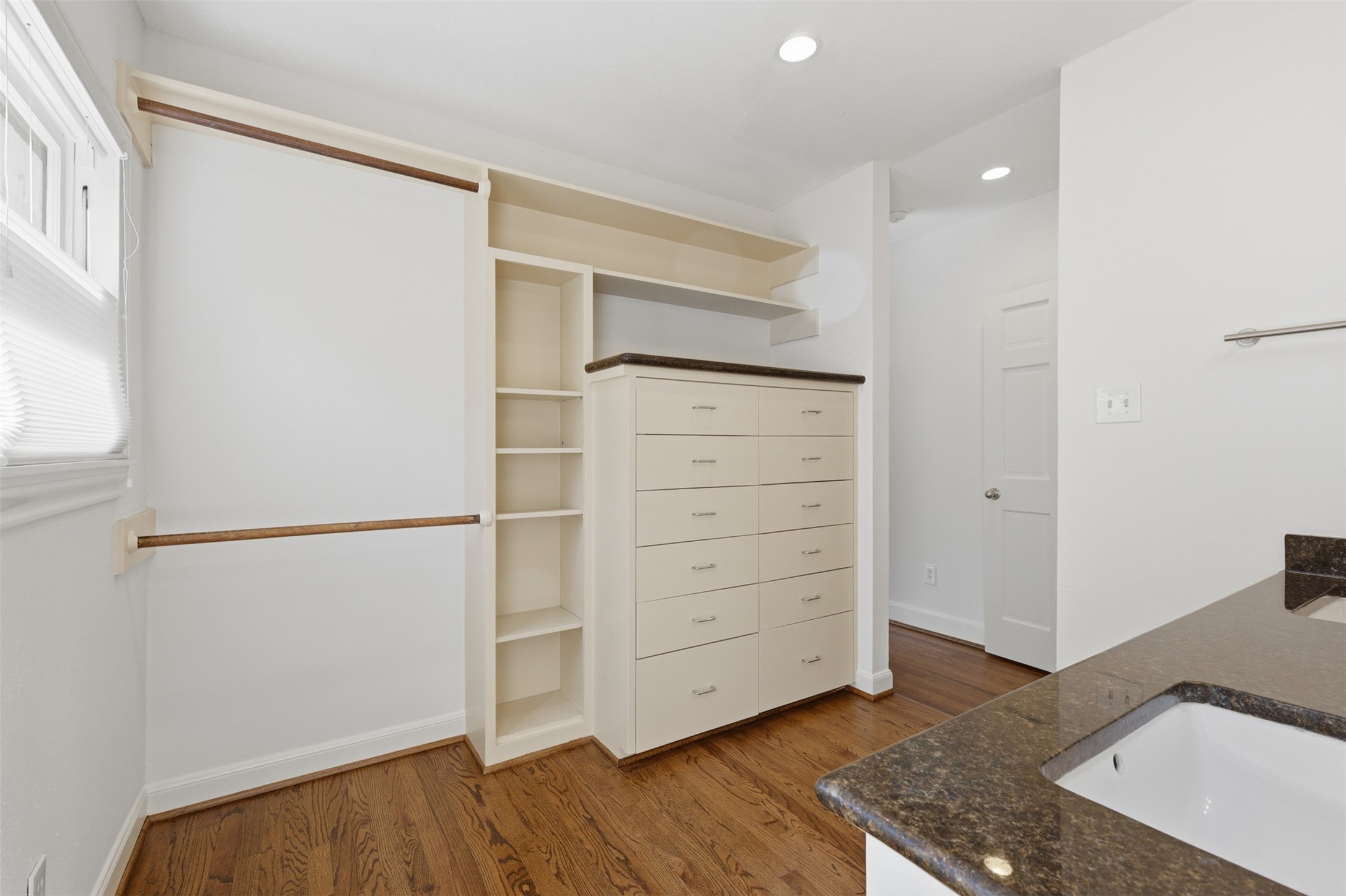2132 Tangley Street Houston, TX 77005 - Photo 19 of 39 One of two closet spaces in the primary bedroom