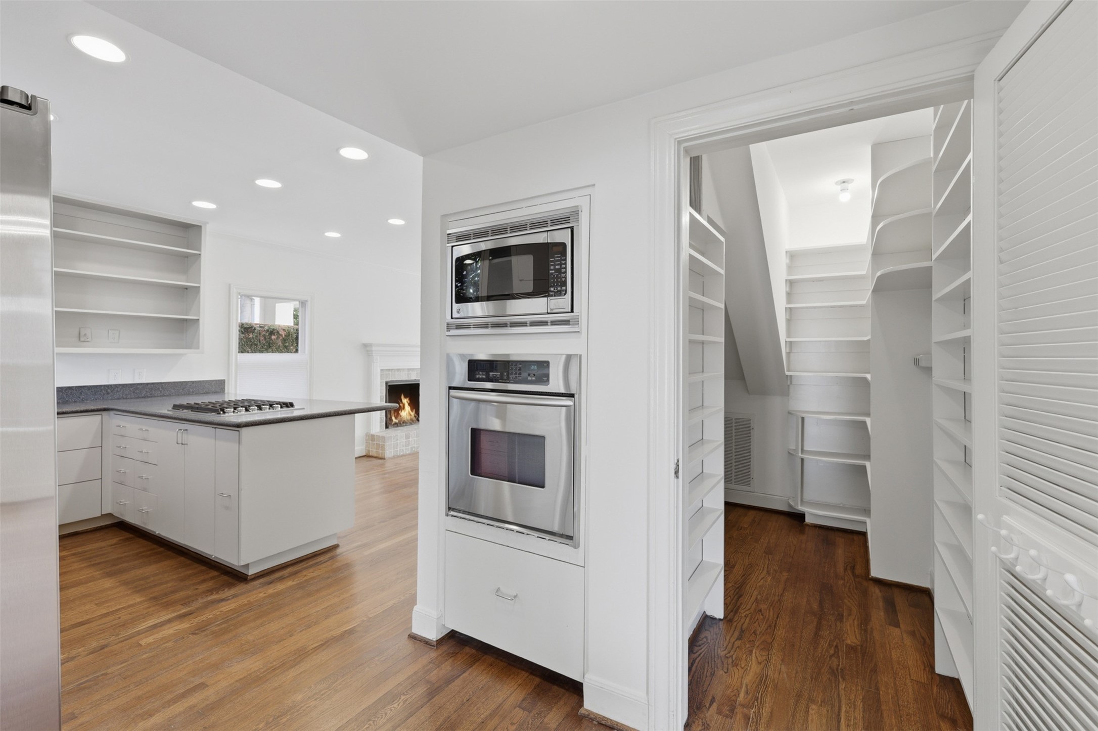 2132 Tangley Street Houston, TX 77005 - Photo 10 of 39 Large pantry next to the oven and built-in microwave
