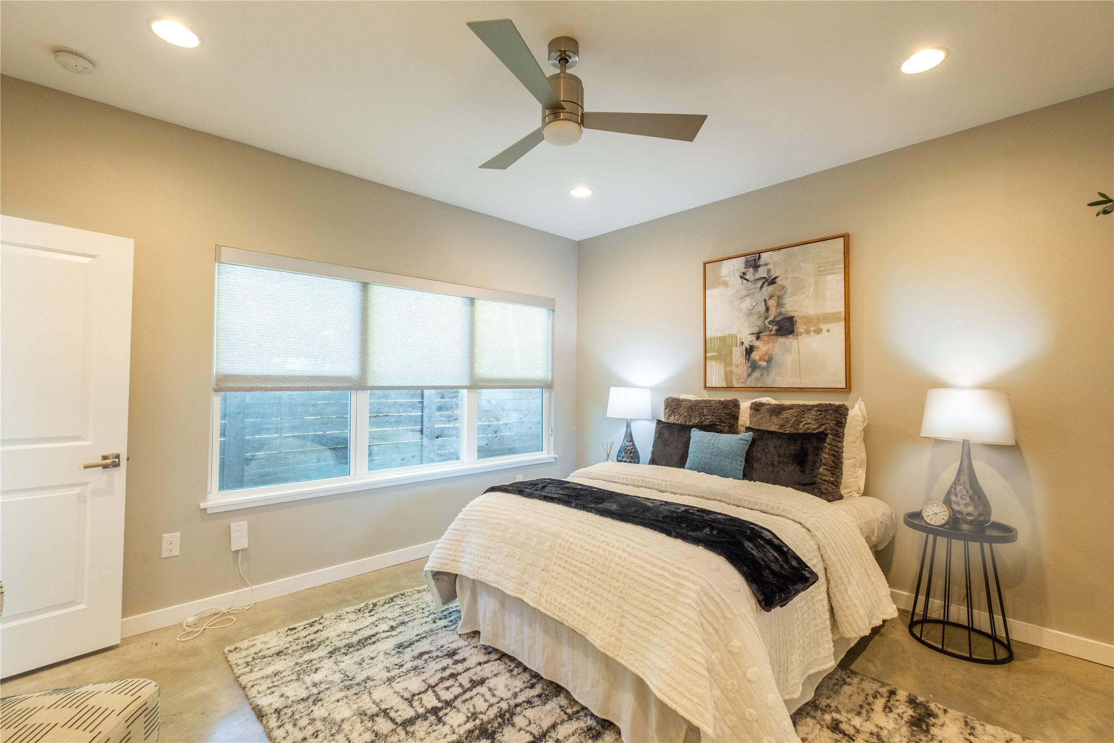 7601 Bethune Avenue, Unit B Austin, TX 78752 - Photo 11 of 39 a bedroom with a bed and a window