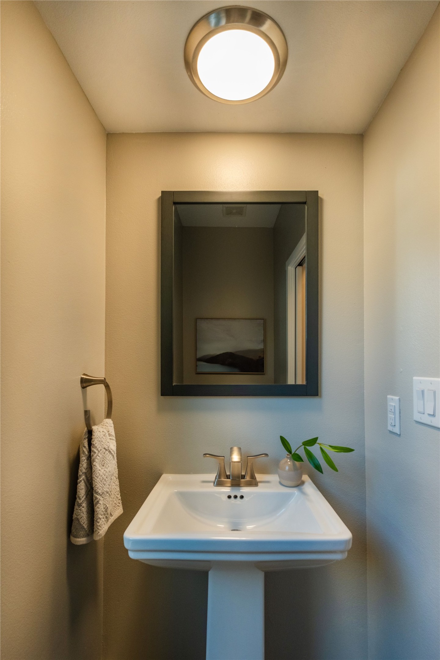 7601 Bethune Avenue, Unit B Austin, TX 78752 - Photo 17 of 39 a bathroom with a sink and a mirror