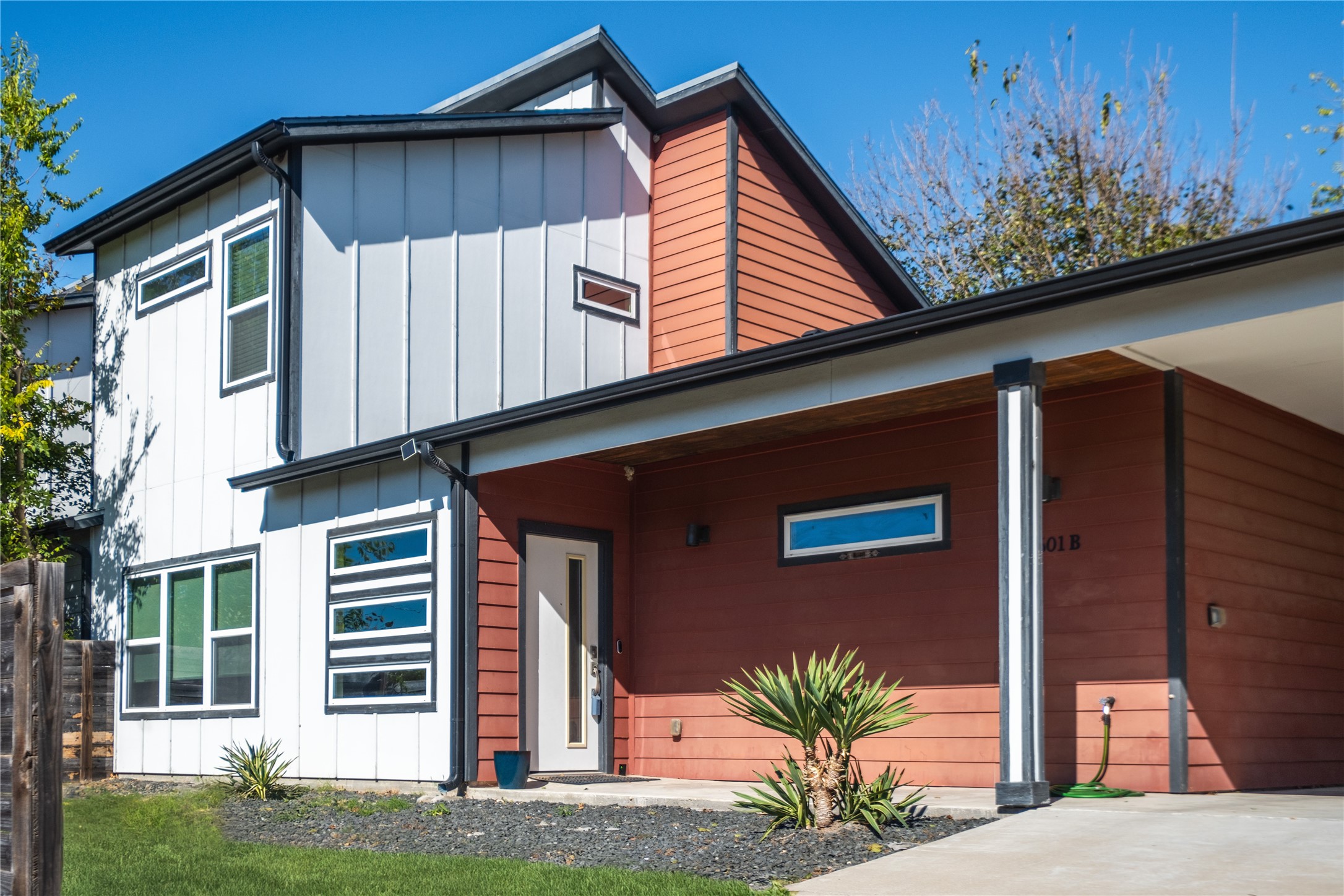 7601 Bethune Avenue, Unit B Austin, TX 78752 - Photo 28 of 39 a front view of a house with a yard