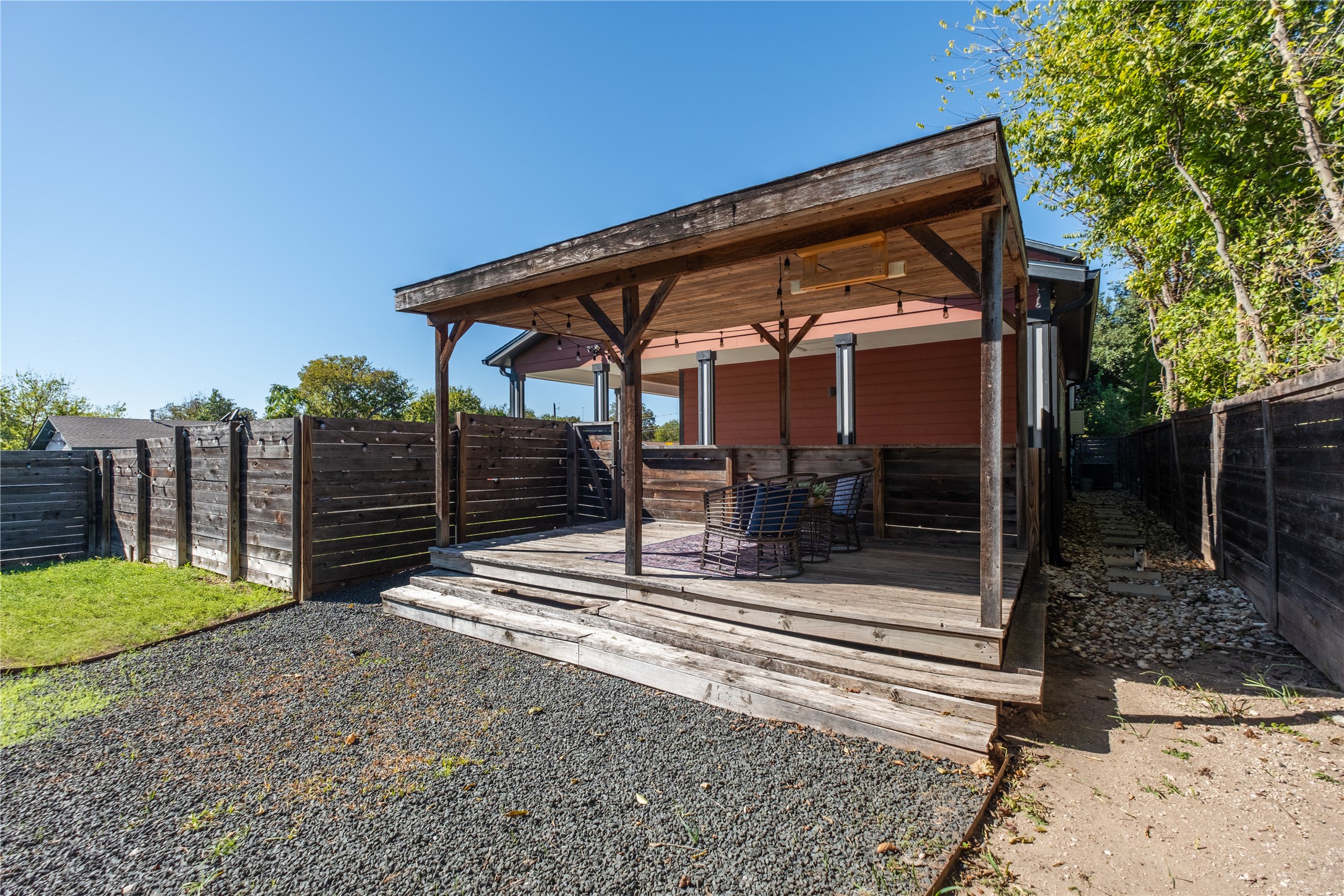 7601 Bethune Avenue, Unit B Austin, TX 78752 - Photo 31 of 39 a view of a house with a small yard and furniture