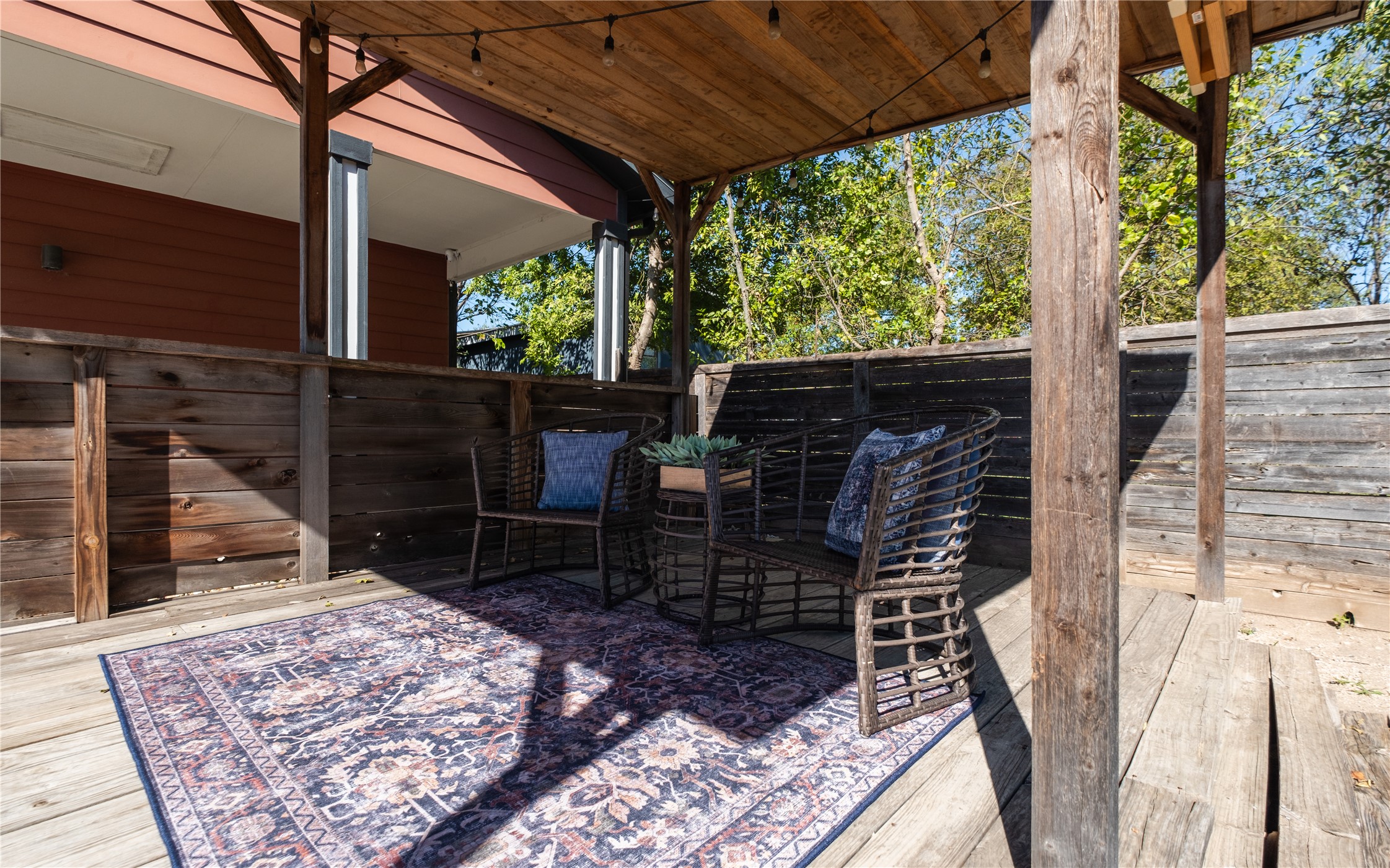 7601 Bethune Avenue, Unit B Austin, TX 78752 - Photo 34 of 39 a view of a porch with wooden floor and a swing