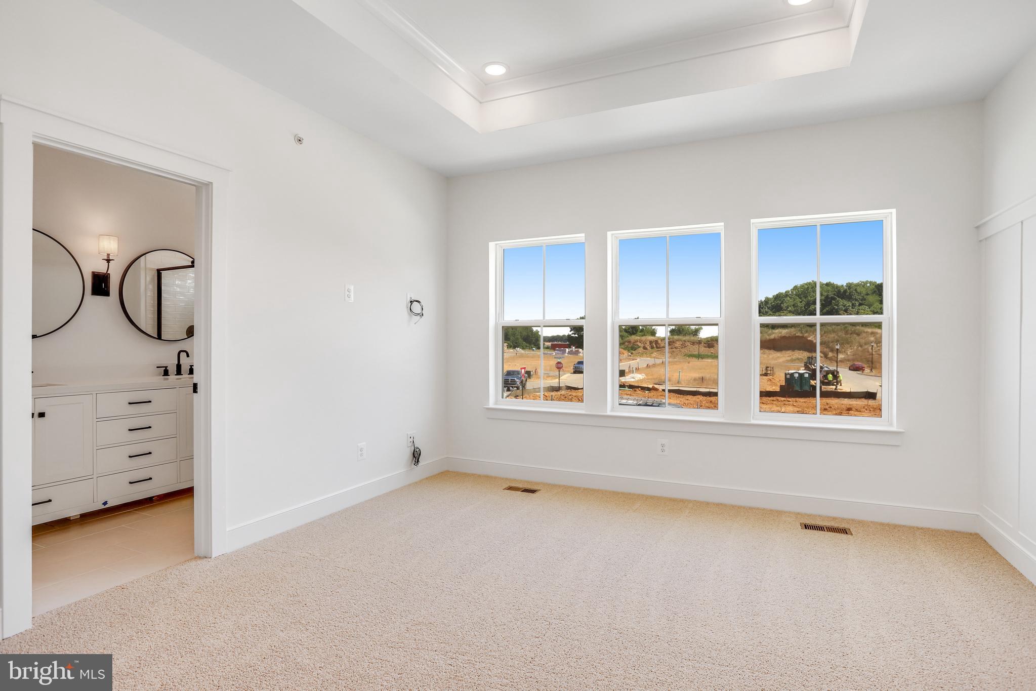 751 Elevation Road Frederick, MD 21702 - Photo 20 of 35 an empty room with windows and closet
