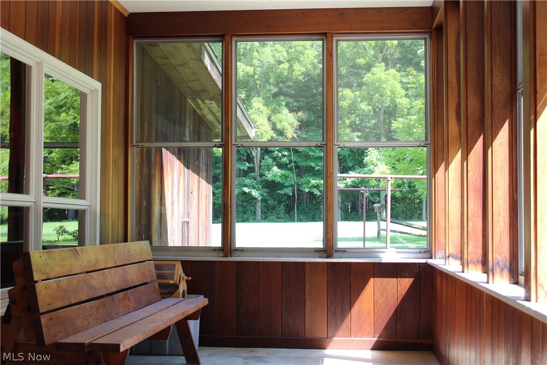 8818 Carnes Road Chagrin Falls, OH 44023 - Photo 18 of 30 Enclosed porch with rare walls of Redwood straight out of California!