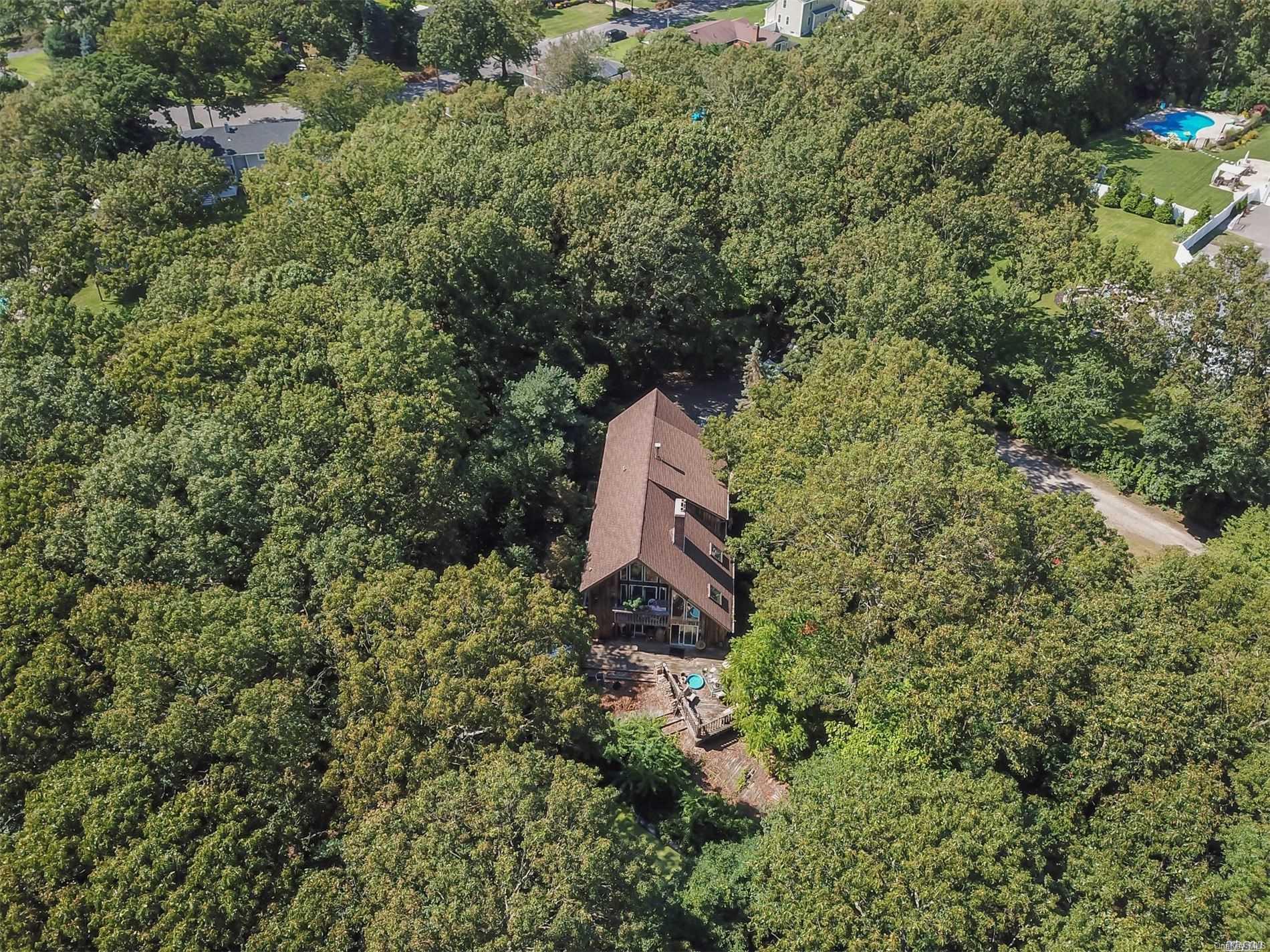 210 Rustic Road Lake Ronkonkoma, NY 11779 - Photo 1 of 1 a view of a lush green field