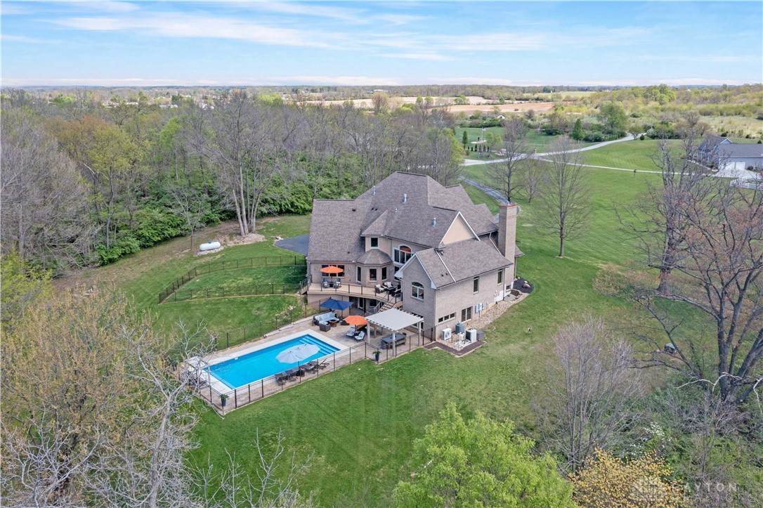 4096 Middle Urbana Road Urbana, OH 43078 - Photo 83 of 96 This expansive estate offers a private pool and ample outdoor space, perfect for tranquil living.