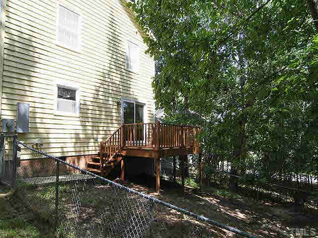 5304 Middleton Road Durham, NC 27713 - Photo 13 of 16 a view of house with backyard space and deck