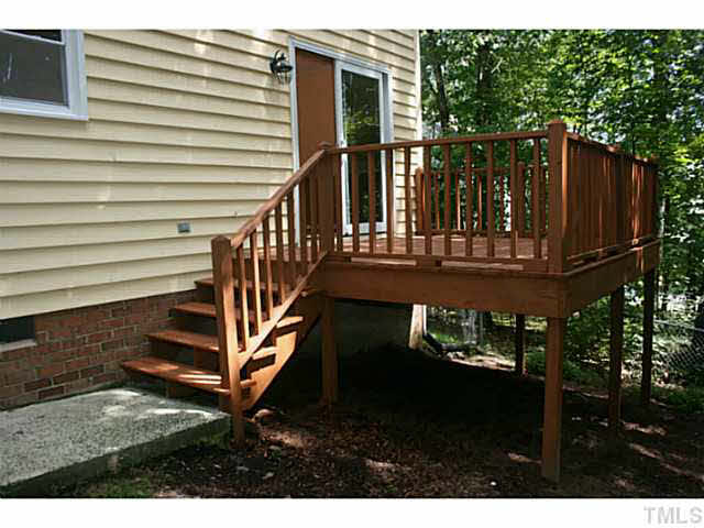 5304 Middleton Road Durham, NC 27713 - Photo 14 of 16 a view of entryway with wooden stairs