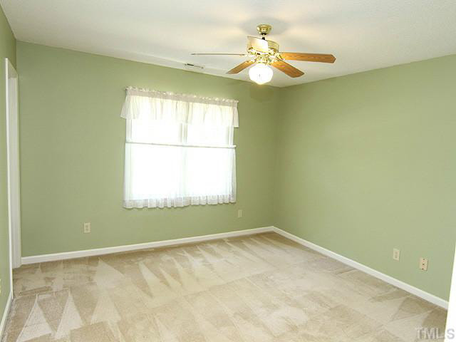 5304 Middleton Road Durham, NC 27713 - Photo 8 of 16 an empty room with a window