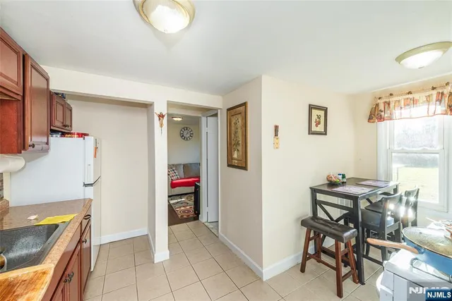 a view of a kitchen and utility room