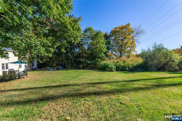 a view of a golf course with a big yard