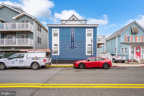 a car parked in front of a house