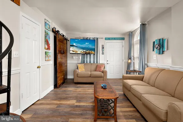 a living room with furniture and a couch