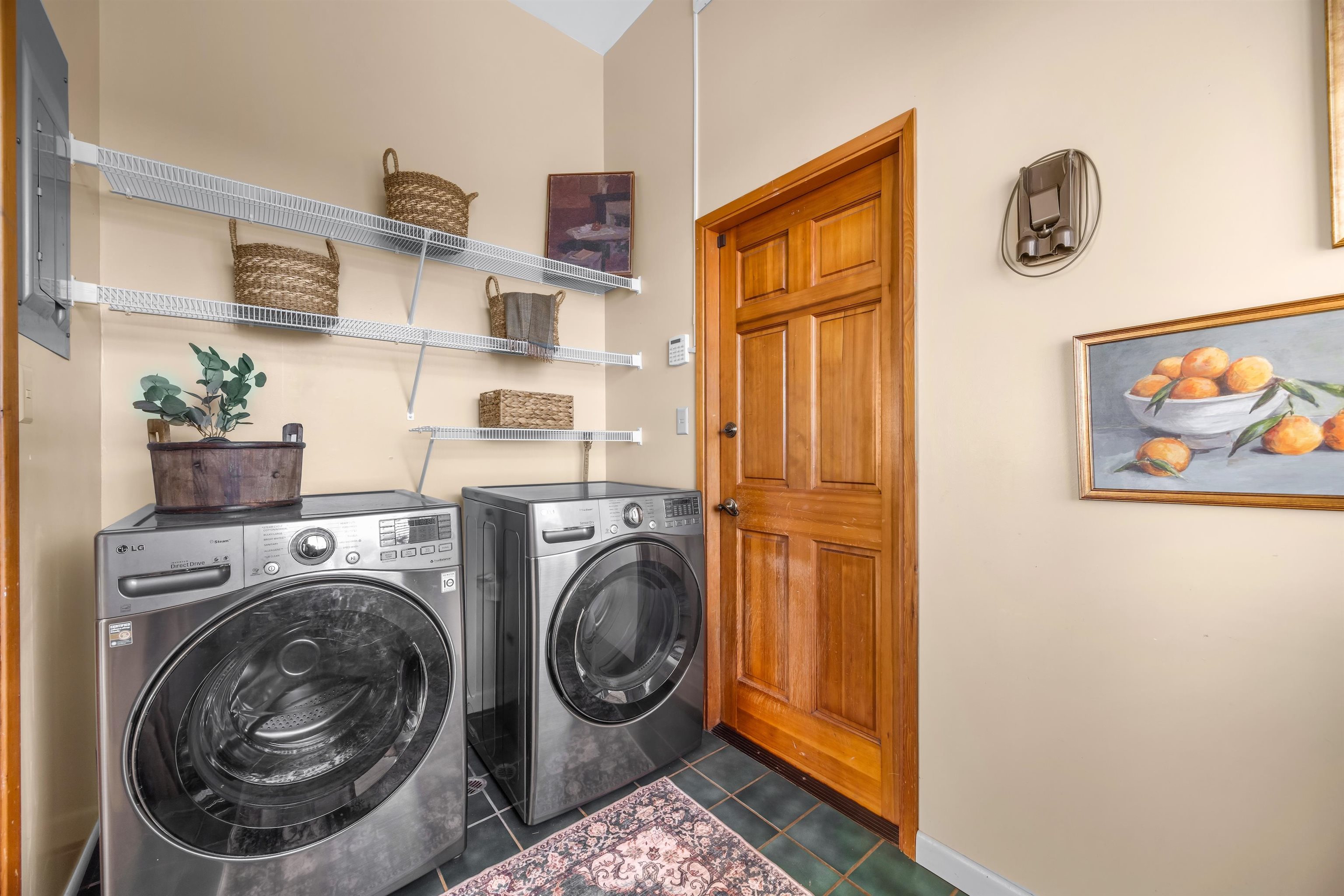 110 Kamehameiki Road Kula, HI 96790 - Photo 24 of 50 a utility room with dryer and washer