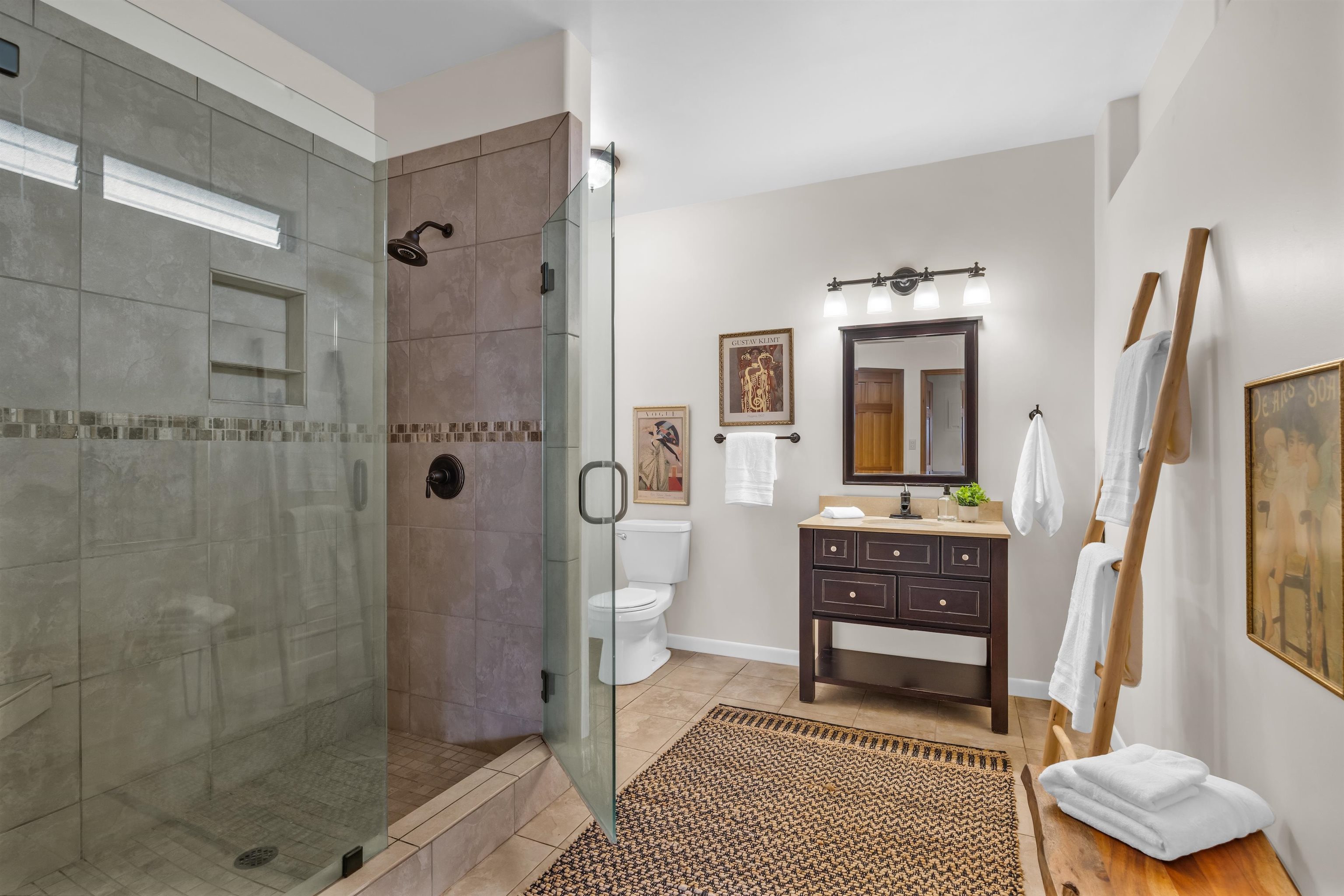 110 Kamehameiki Road Kula, HI 96790 - Photo 26 of 50 a bathroom with a shower a sink and a mirror