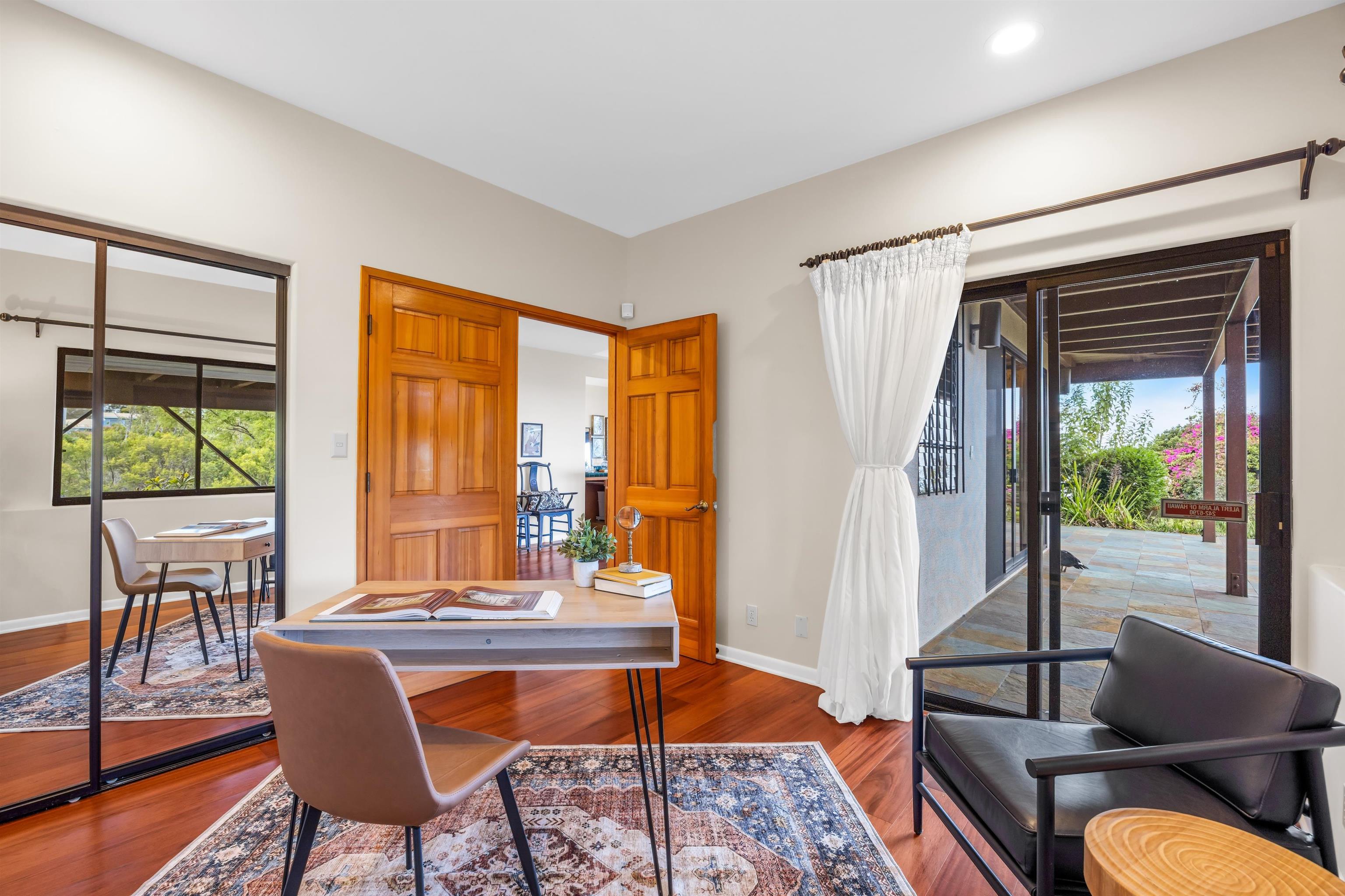 110 Kamehameiki Road Kula, HI 96790 - Photo 33 of 50 a living room with furniture and a window