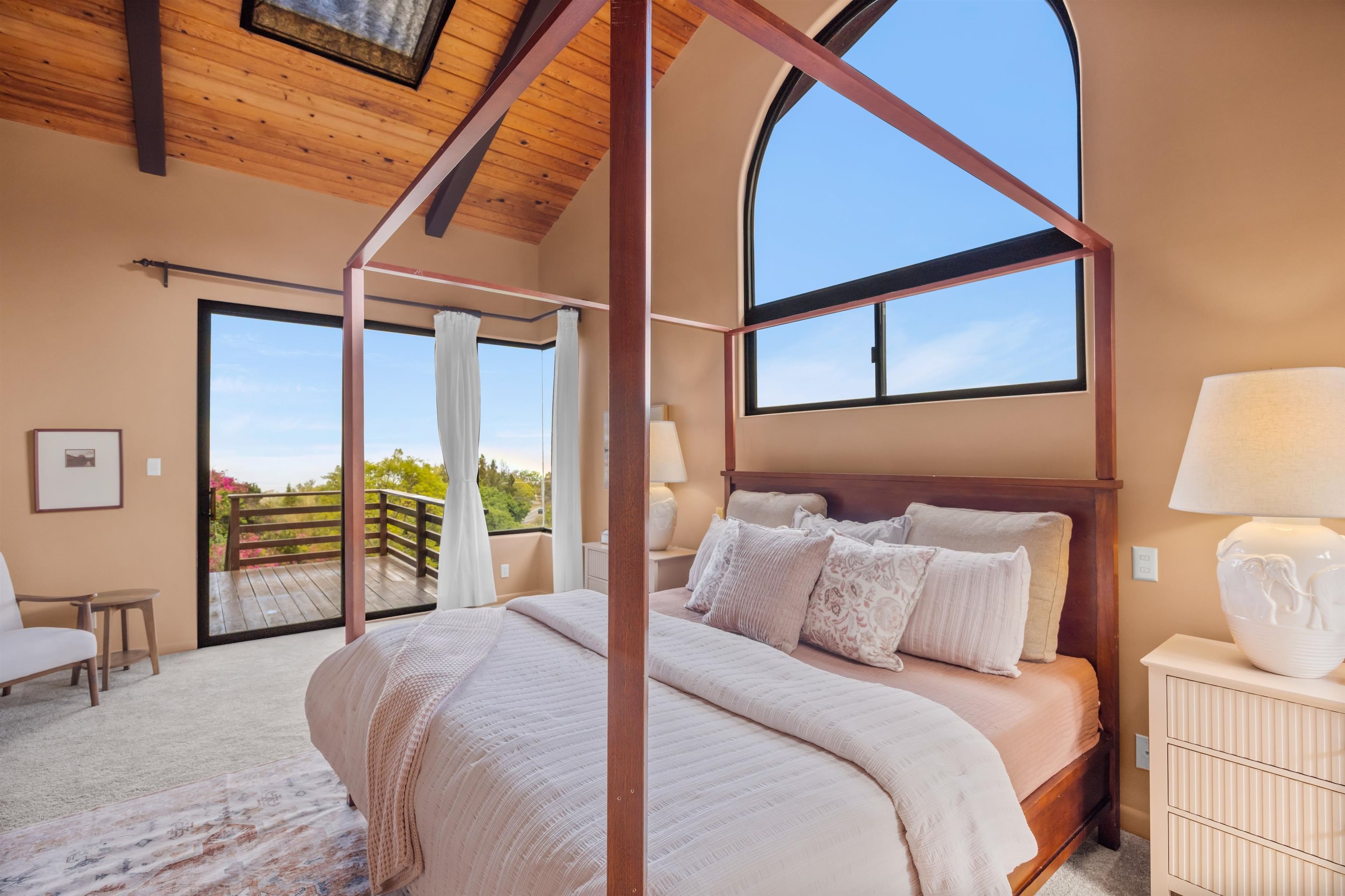 110 Kamehameiki Road Kula, HI 96790 - Photo 43 of 50 a bedroom with a bed and a large window