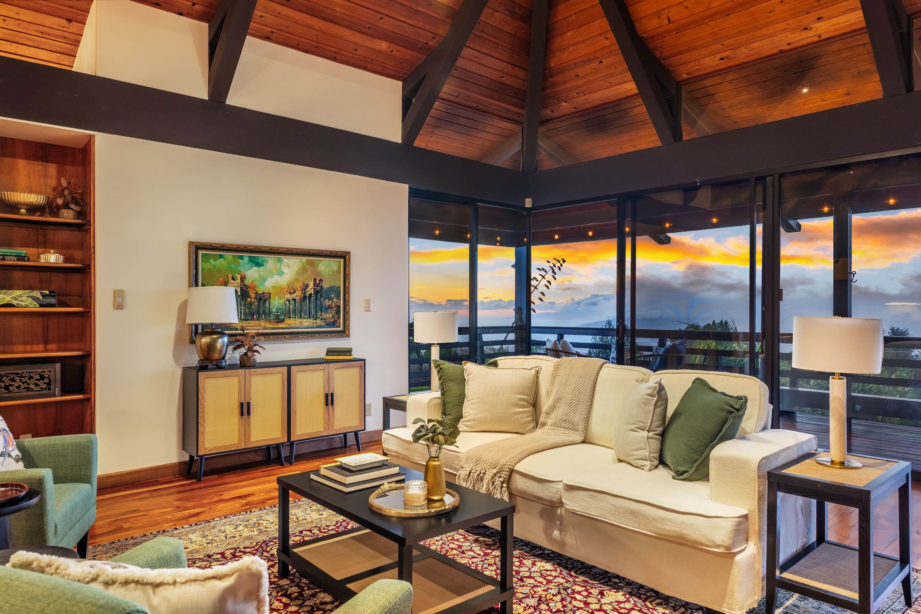 110 Kamehameiki Road Kula, HI 96790 - Photo 6 of 50 a living room with furniture and a flat screen tv