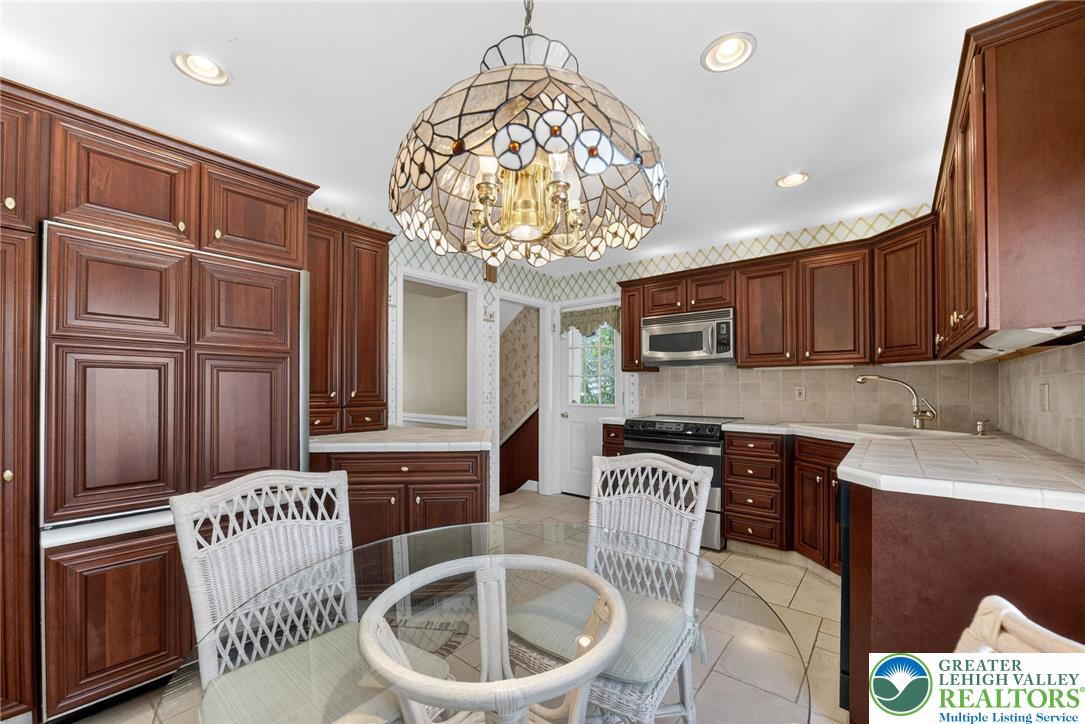 3535 Altonah Road Bethlehem, PA 18017 - Photo 27 of 49 a kitchen with a sink cabinets and window