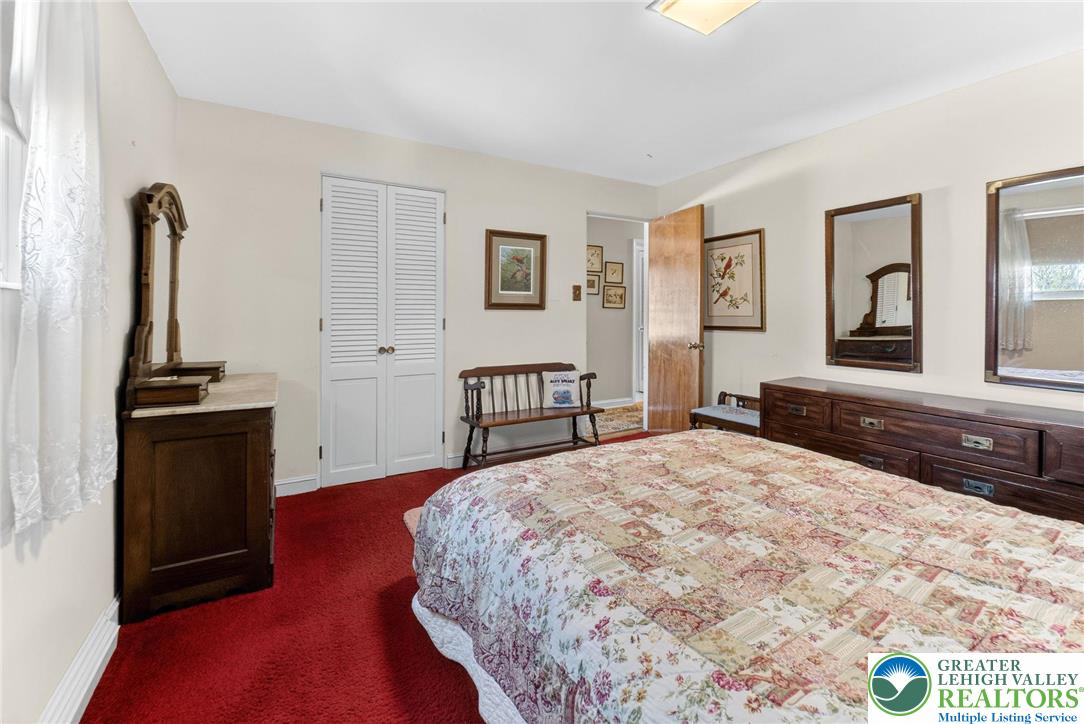 3535 Altonah Road Bethlehem, PA 18017 - Photo 33 of 49 a bedroom with a bed and wooden floor