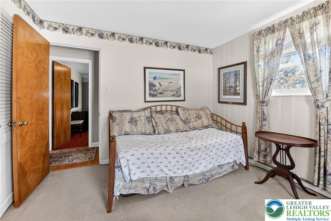 3535 Altonah Road Bethlehem, PA 18017 - Photo 35 of 49 a bedroom with a bed and painting on the wall