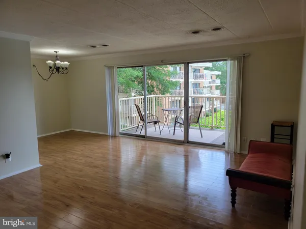 a view of a room with a large window