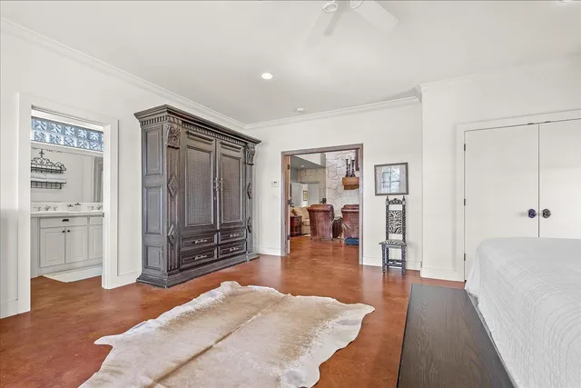 a hallway with a dining table and chairs