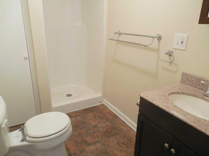2115 Rankintown Road Finleyville, PA 15332 - Photo 10 of 25 Full Bath. The BRAND NEW first floor bath features espresso cabinetry with granite counter.