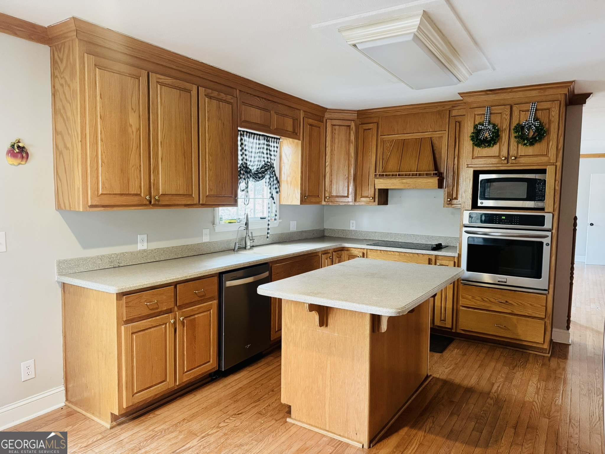 110 Pine Street Barnesville, GA 30204 - Photo 3 of 31 a room with storage and utility