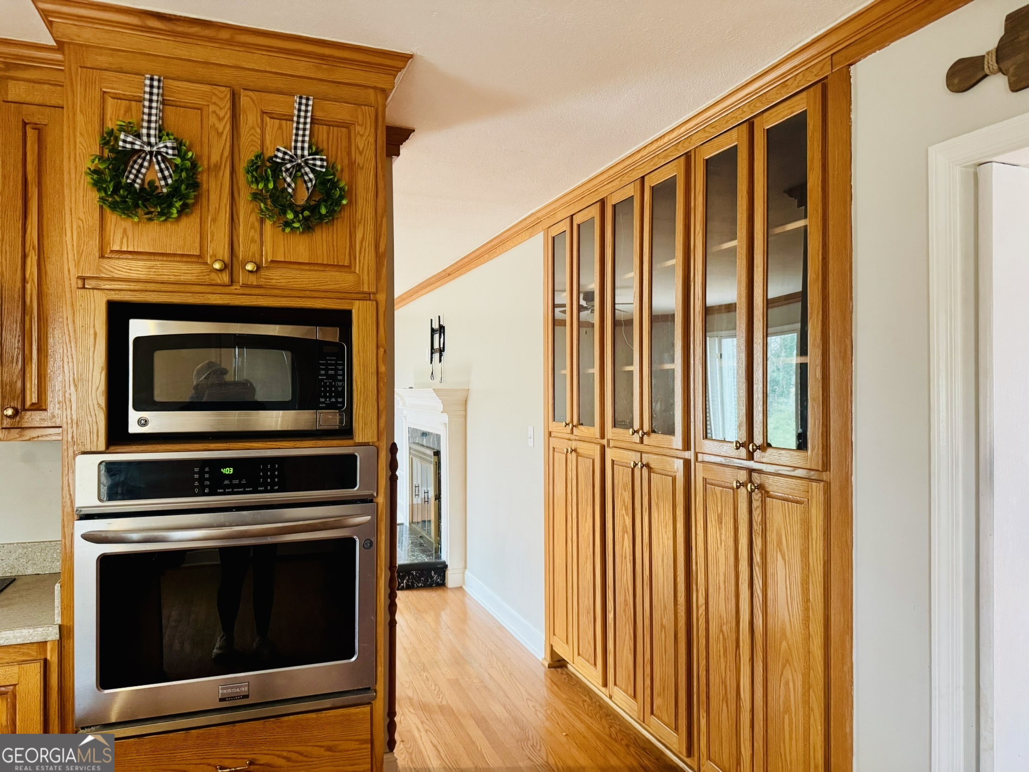 110 Pine Street Barnesville, GA 30204 - Photo 5 of 31 a stove top oven sitting inside of a kitchen