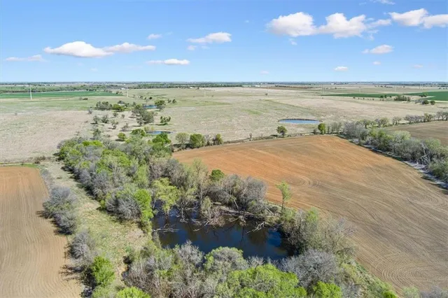 a view of an ocean beach and city