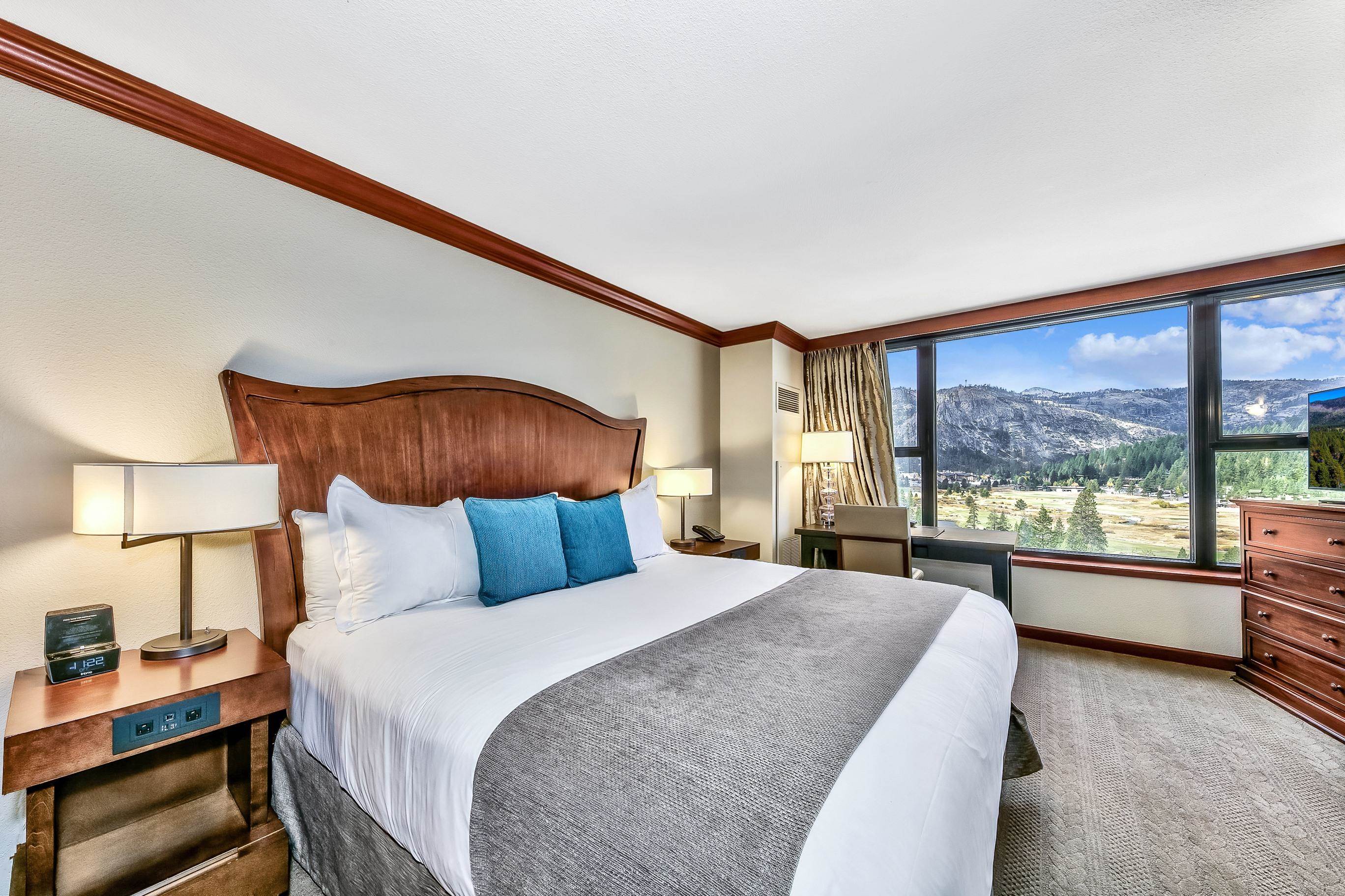 400 Resort Road, Unit 958 Olympic Valley, CA 96146 - Photo 11 of 21 a bedroom with a large bed and a large window with outer view