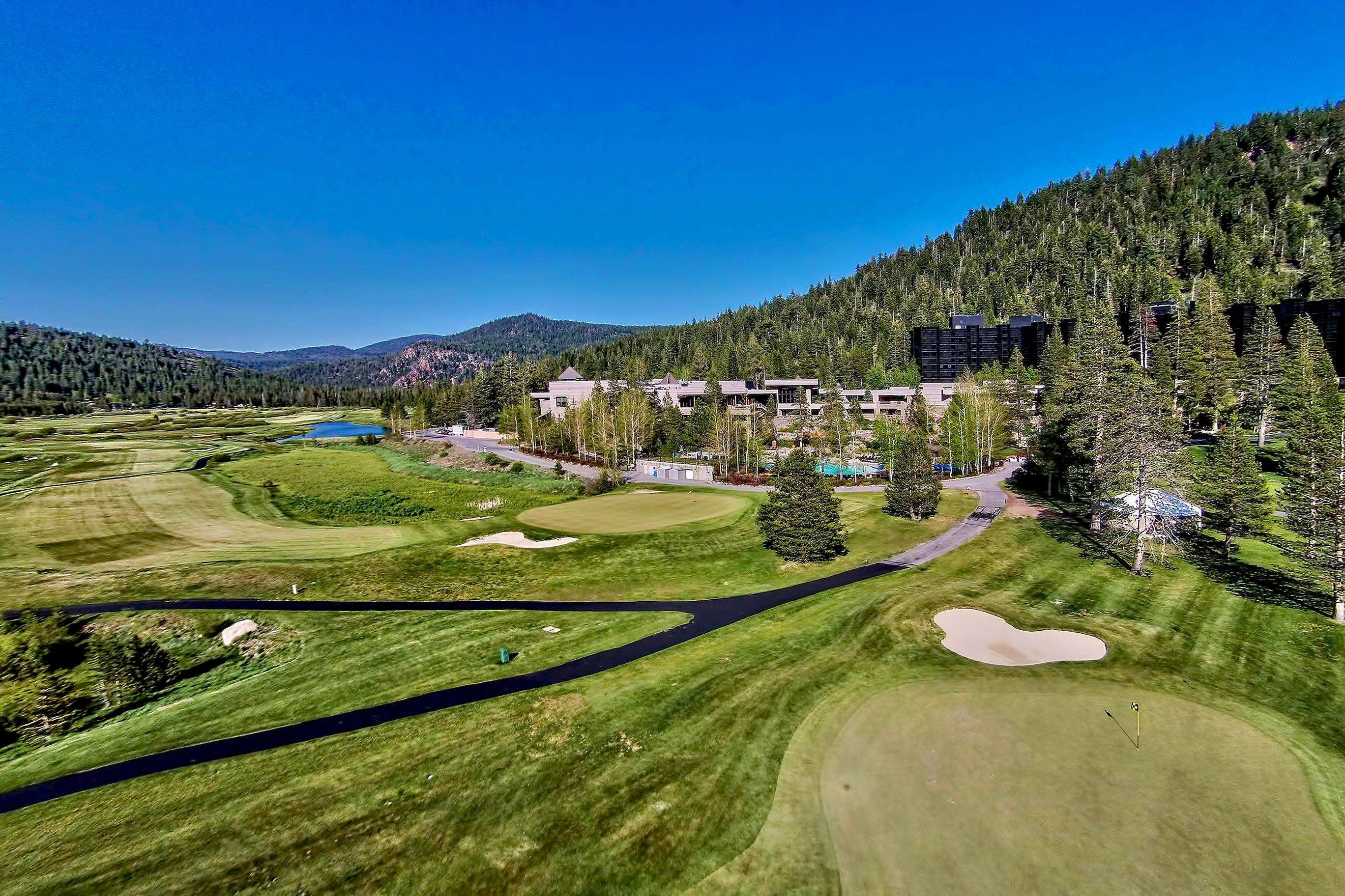 400 Resort Road, Unit 958 Olympic Valley, CA 96146 - Photo 12 of 21 a view of a lake with a yard