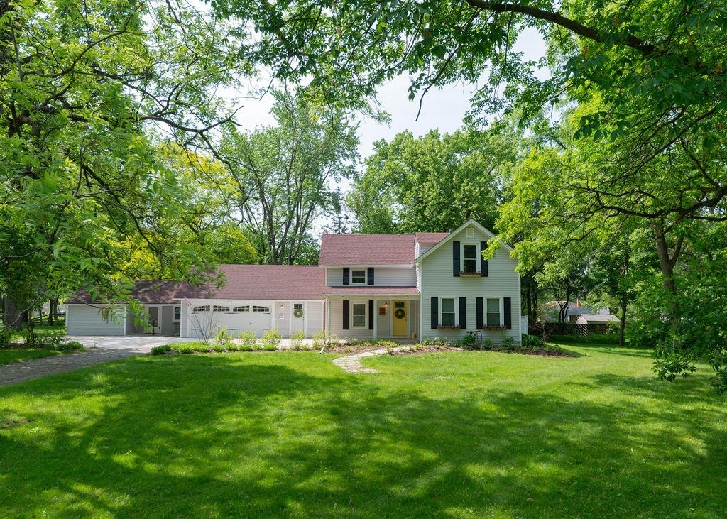 3711 Highcrest Road Rockford, IL 61107 - Photo 1 of 58 a front view of a house with a yard