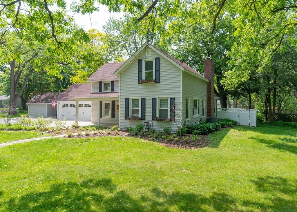 3711 Highcrest Road Rockford, IL 61107 - Photo 3 of 58 a view of a house with a yard