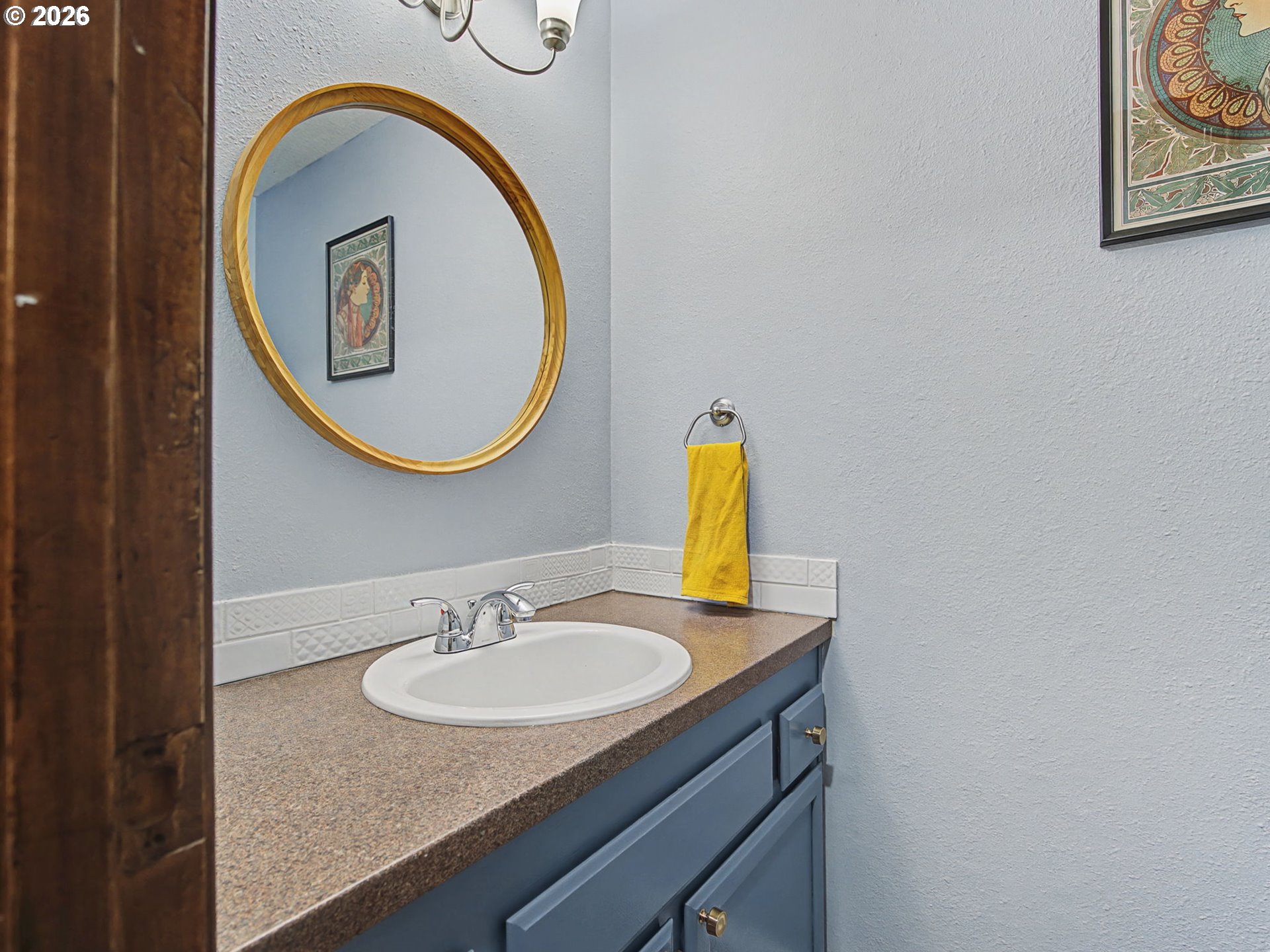 3214 Northeast 29th Street Gresham, OR 97030 - Photo 12 of 42 a bathroom with a granite countertop sink and a mirror