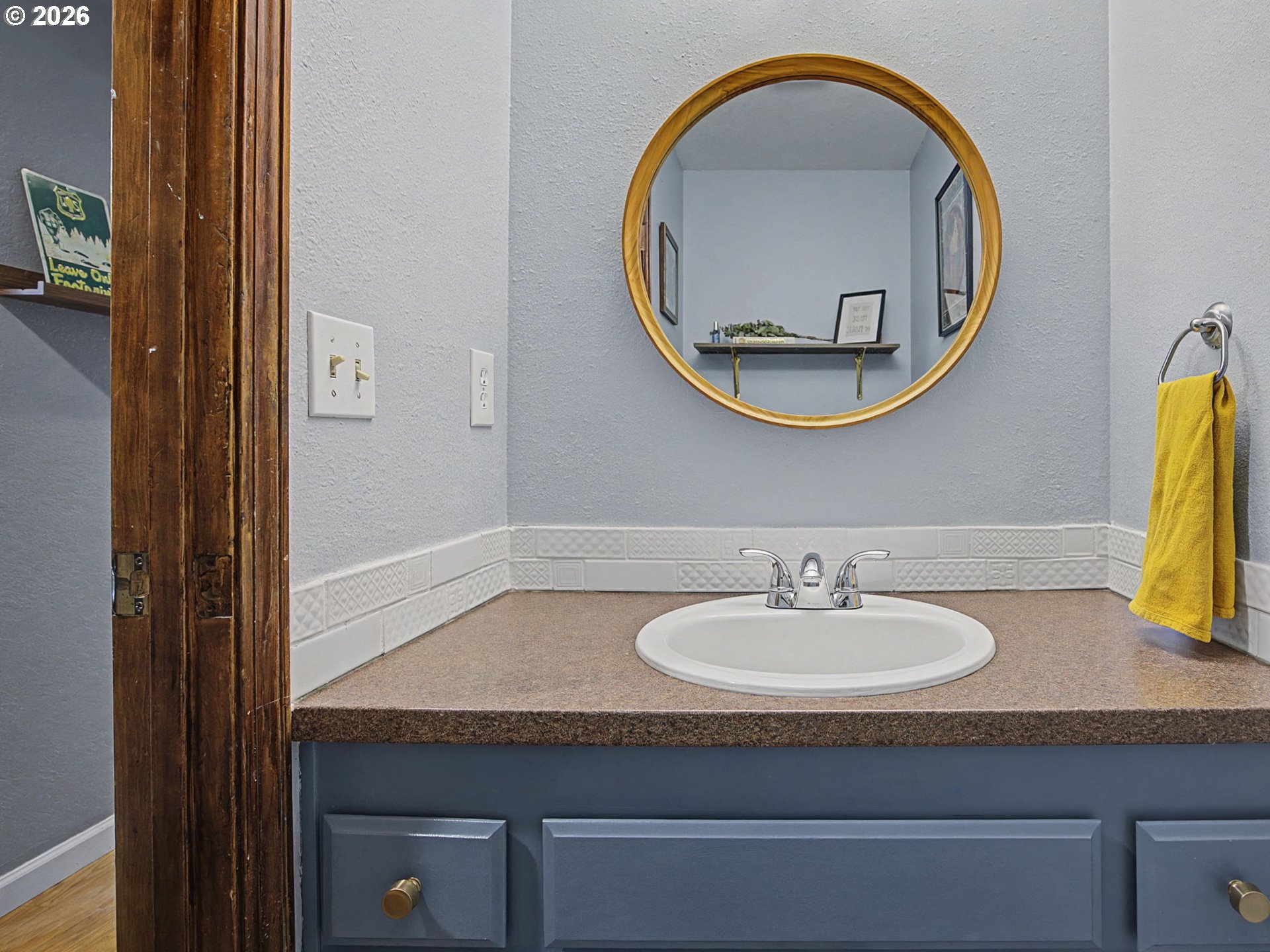 3214 Northeast 29th Street Gresham, OR 97030 - Photo 13 of 42 a bathroom with a sink and a mirror