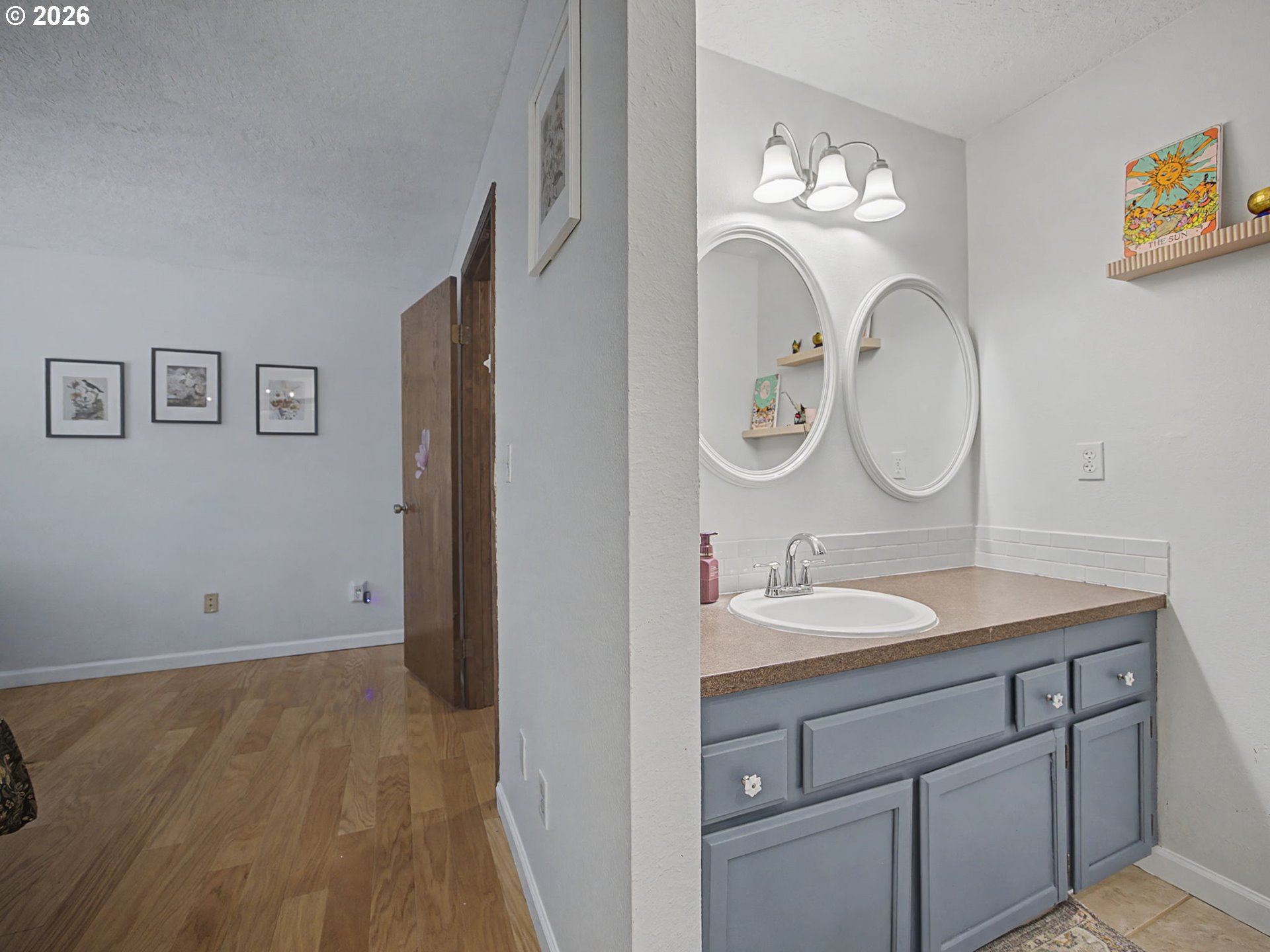 3214 Northeast 29th Street Gresham, OR 97030 - Photo 19 of 42 a bathroom with a sink and a mirror