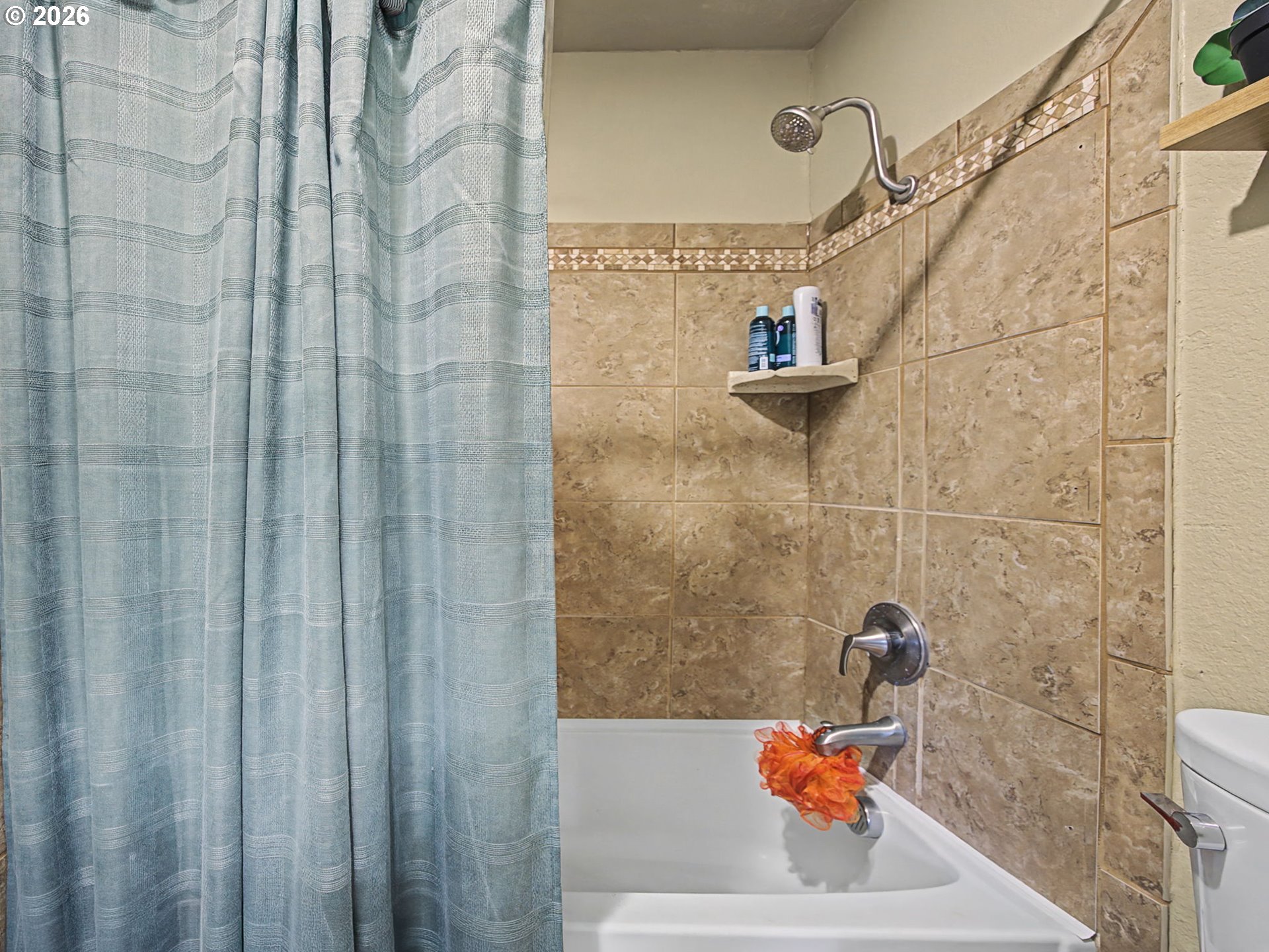 3214 Northeast 29th Street Gresham, OR 97030 - Photo 25 of 42 a bathroom with a sink a toilet and shower