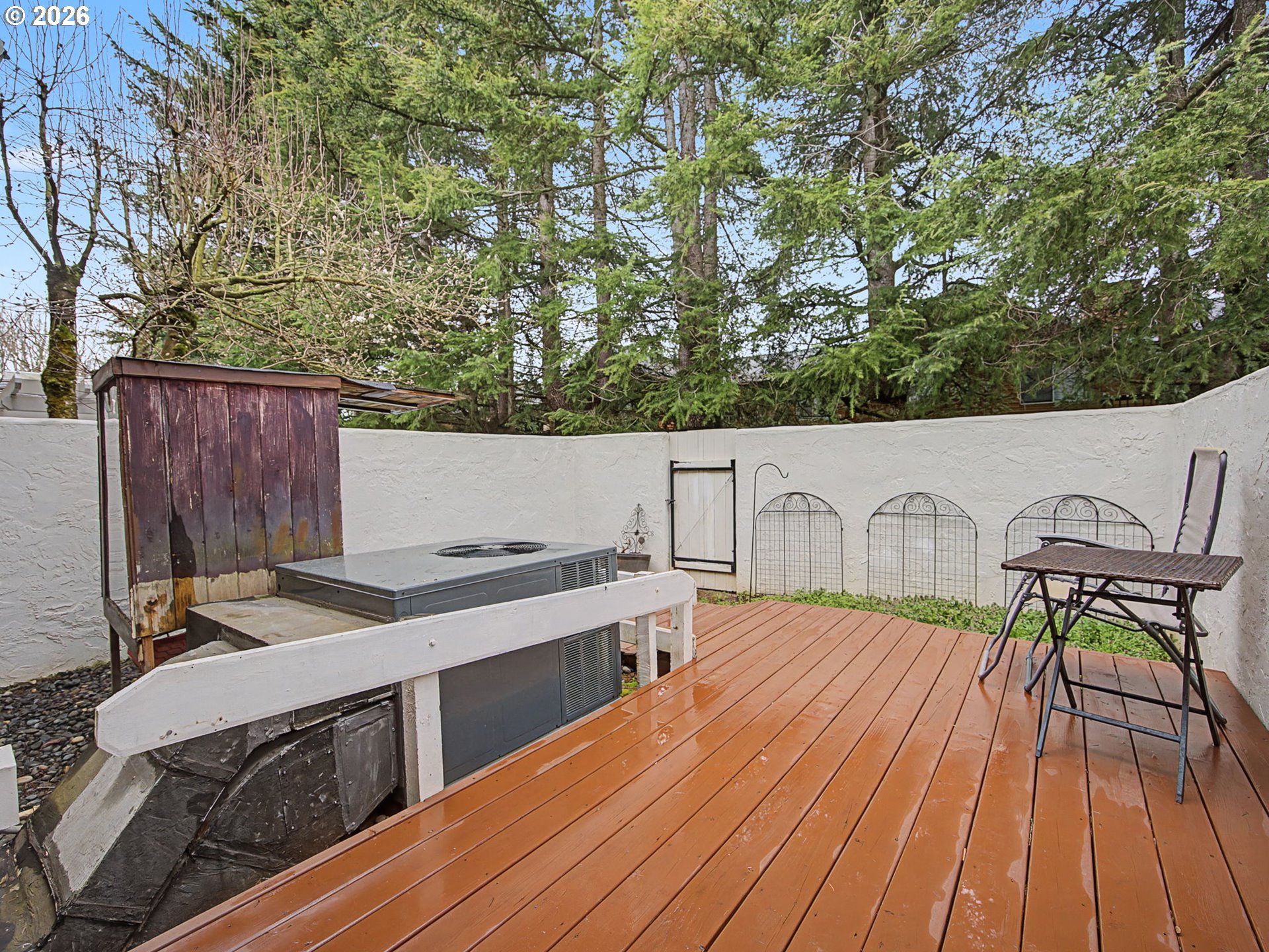 3214 Northeast 29th Street Gresham, OR 97030 - Photo 28 of 42 a view of a chairs and table on the wooden deck