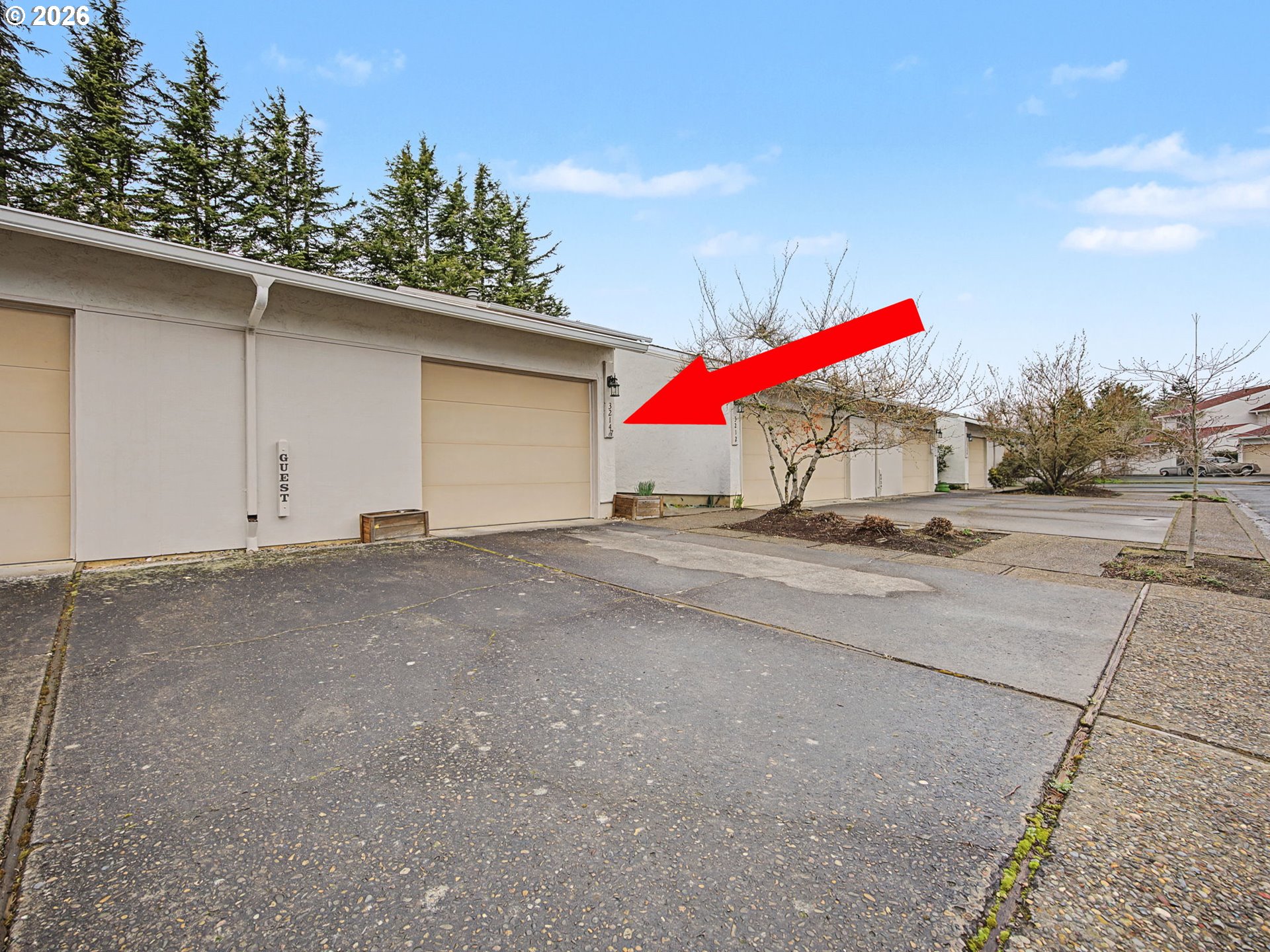 3214 Northeast 29th Street Gresham, OR 97030 - Photo 37 of 42 a view of a house with a street and a garage