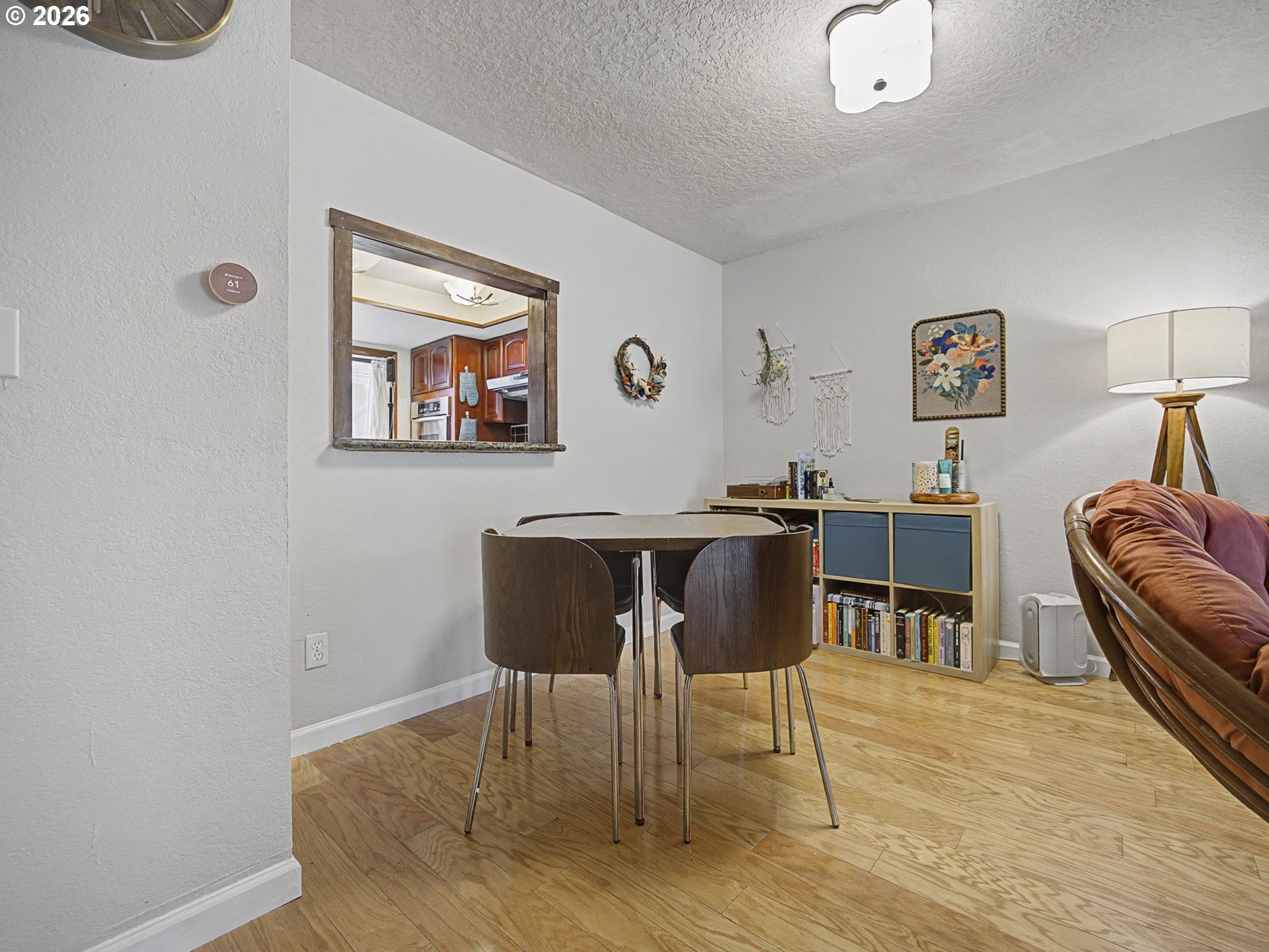 3214 Northeast 29th Street Gresham, OR 97030 - Photo 8 of 42 a view of a dining room with furniture and wooden floor