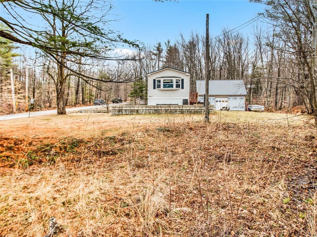 5 Coolidge Road Dixfield, ME 04224 - Photo 22 of 32 The garage has two entries: one...