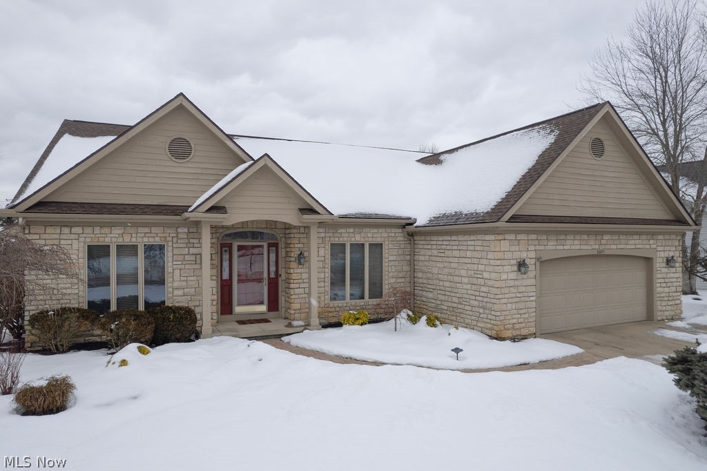 36845 Aberdeen Lane Solon, OH 44139 - Photo 1 of 24 View of front of house with an attached garage and stone siding