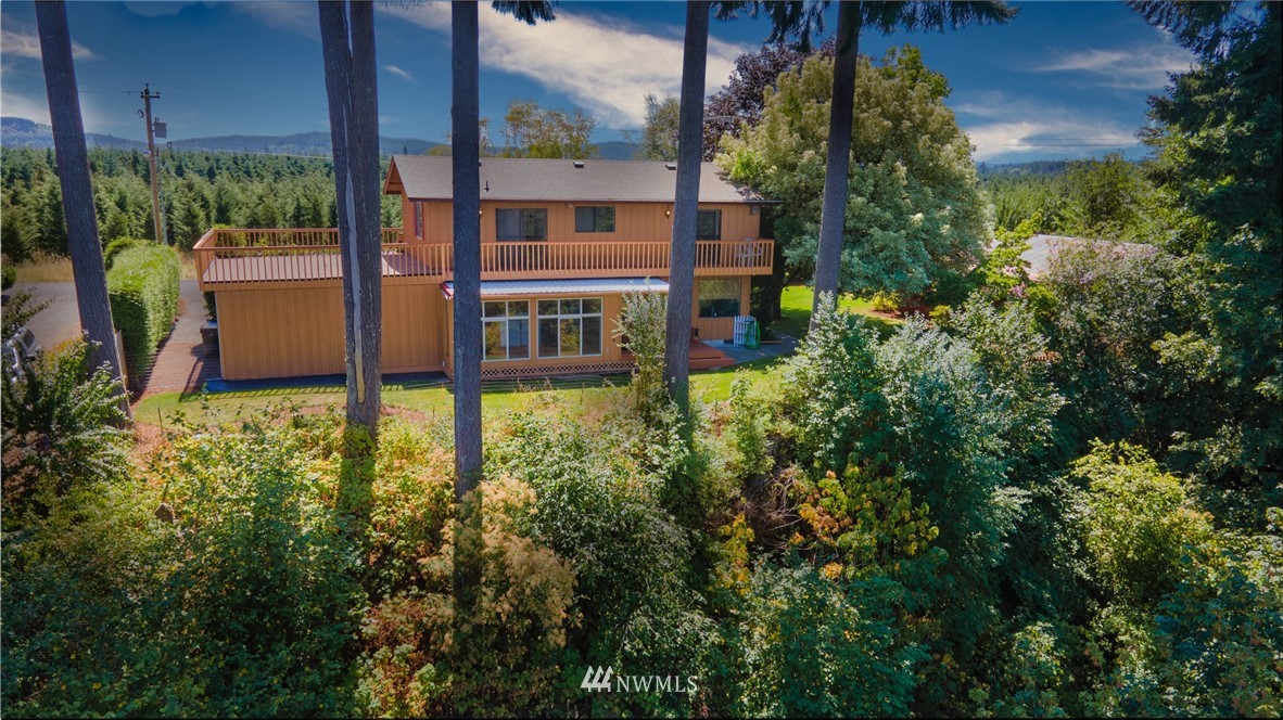 an aerial view of a house with balcony