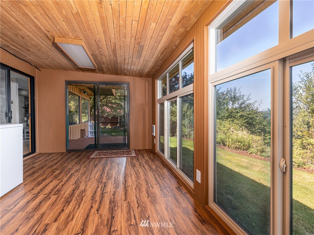 765 Eadon Road Toledo, WA 98591 - Photo 20 of 40 a view of hallway with wooden floor and door