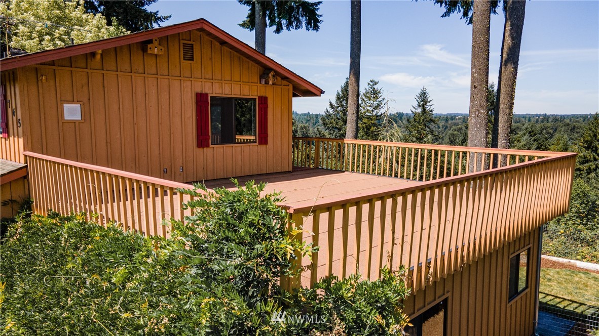 765 Eadon Road Toledo, WA 98591 - Photo 22 of 40 a view of a house with a small yard next to a house