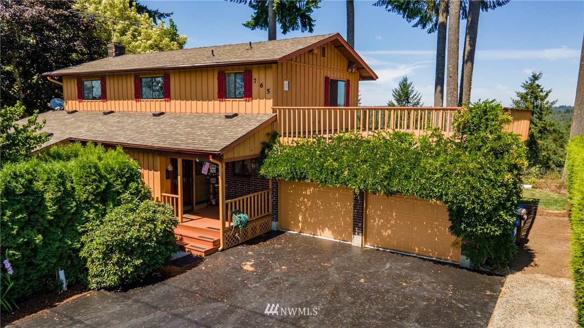 765 Eadon Road Toledo, WA 98591 - Photo 24 of 40 front view of a house with a yard